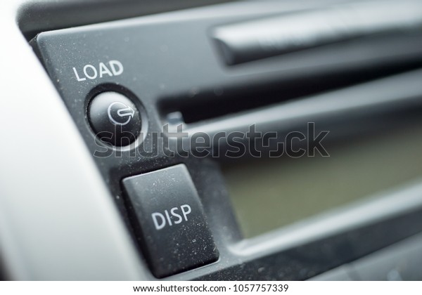 Load button on the car\
stereo.