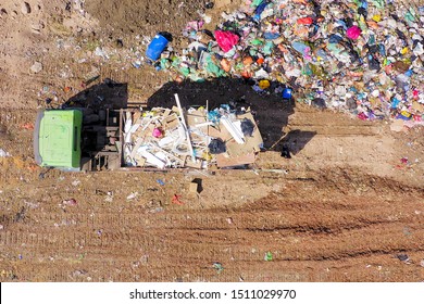 Loaded Garbage Truck At A Municipal Landfill, Top Down Aerial Image.