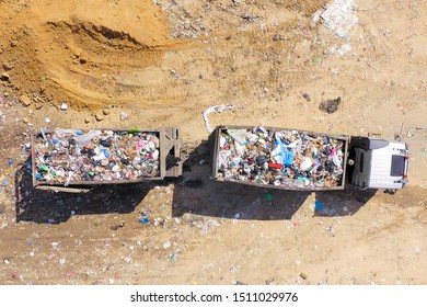 Loaded Garbage Truck At A Municipal Landfill, Top Down Aerial Image.