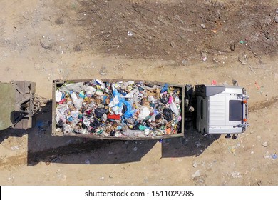 Loaded Garbage Truck At A Municipal Landfill, Top Down Aerial Image.