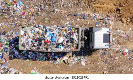 Loaded Garbage Truck At A Municipal Landfill, Top Down Aerial Image.