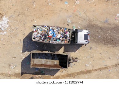 Loaded Garbage Truck At A Municipal Landfill, Top Down Aerial Image.