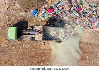 Loaded Garbage Truck At A Municipal Landfill, Top Down Aerial Image.