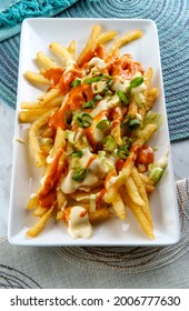 Loaded Pepper Jack Cheese Fries With Chipotle Sauce And Scallions