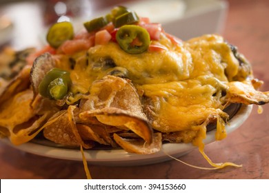 Loaded Potato Nachos With Melted Cheddar Cheese