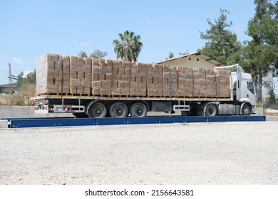 loaded trailer truck on weighbridge 