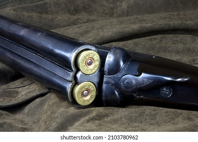 Loaded Vintage Shotgun On An Outdoor Shooting Coat