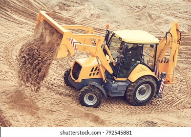 Loader Excavator With Backhoe At Earthmoving Works