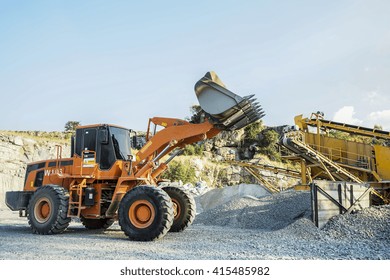 A Loader excavator mining and construction machinery equipment in operating action