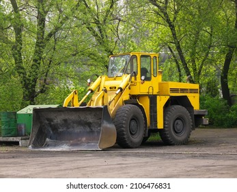 Loader With A Large Bucket Stands At A Ferrous Metallurgy Enterprise 