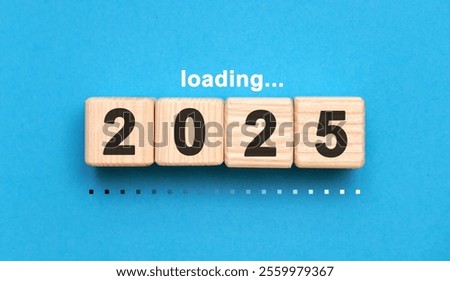 Loading in 2025 on a blue background