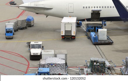 Loading An Aeroplane With Airfreight At An Airport