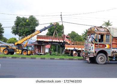 Loading Broken Tempo On A Tow Truck. Damage Vehicle After Crash Accident On The Highway Road. India/ Kerala /angamaly 10/05/2020