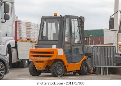 Loading Cargo Truck Trailer With Forklift Outside