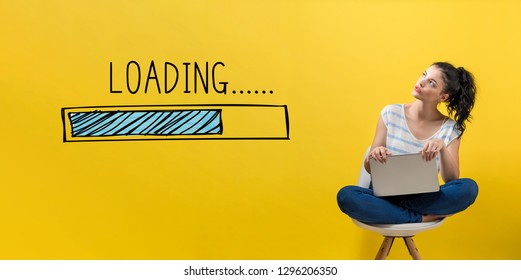 Loading concept with young woman using a laptop computer 