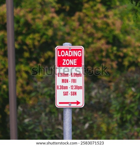Loading Zone—stopping for deliveries only. Keep moving and leave the space free for trucks!