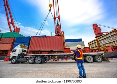 the loading and discharging operation container ship vessel in port takes control by stevedore and foreman in charge, working in port terminal being for logistics and transport services to worldwide