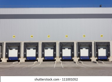 Loading Dock Cargo Doors At Big Warehouse