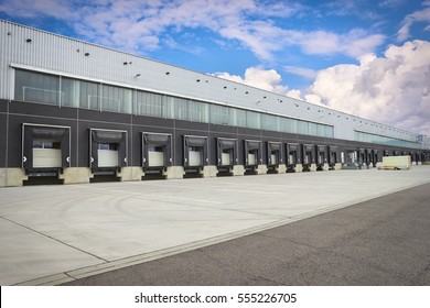 Loading Dock Cargo Doors At Big Warehouse 