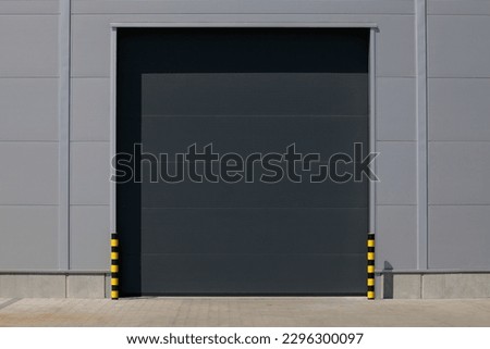 Loading dock entrance with roll-up door in industrial building