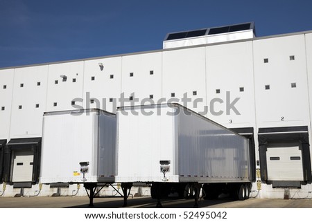 Loading docks under blue sky.