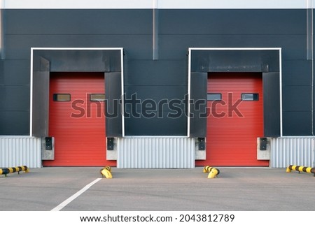 Loading doors of a distribution warehouse for loading goods. Roller gates.