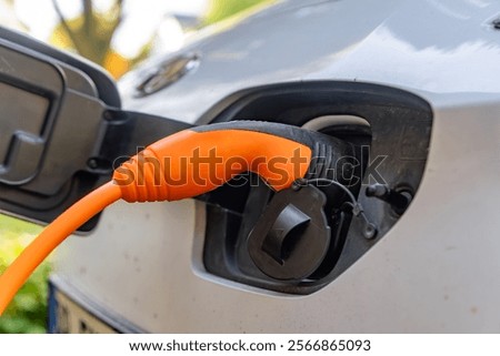 loading electrically powered car outdoors