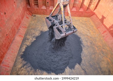 Loading Of Iron Ore Concentrate By Steel Grab Inside Cargo Hold