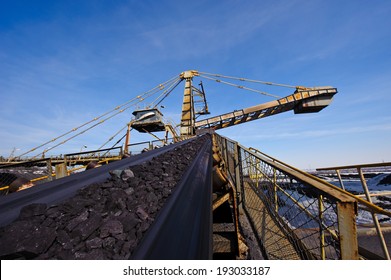 Loading Iron Ore Conveyor Machine From The Warehouse, Mining Production