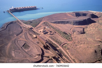 Loading Iron Ore On A Ship At Dampier Western Australia.