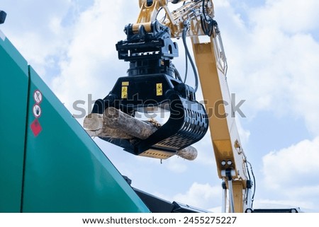Loading of timber. Loader close up	