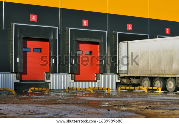 Loading vehicles at the logistics center. Loading\
docks of the warehouse\
center.