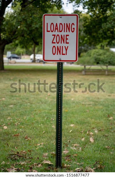 Loading Zone Only Signage in\
Park