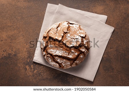 Image, Stock Photo Bread buns in a basket hanging on a blue wall