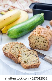 Loaf of homemade banana zucchini bread with walnuts