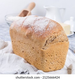 Loaf Of Homemade No Knead Sandwich Bread With White Cloth, Square