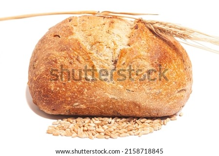 Similar – Image, Stock Photo A round loaf of bread lies on baking paper and is about to go into the oven