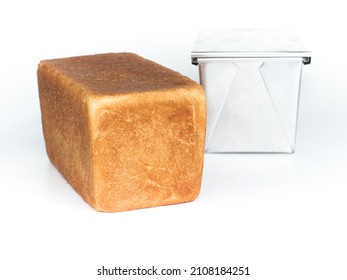 Loaf of white sandwich bread with baking tin mold - Shutterstock ID 2108184251