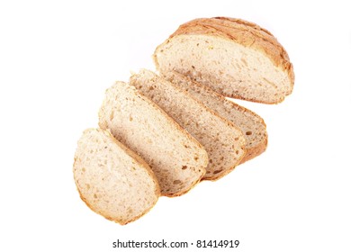 A loaf of whole grain bread sliced on a white background - Shutterstock ID 81414919