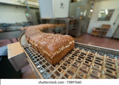 Loafs of bread being made in a factory