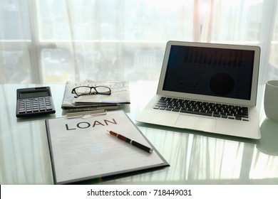 Loan Agreement Document On Desk Of Bank Loan Officer. Concept Of Business Loan.