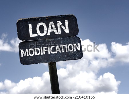 Loan Modification sign with clouds and sky background 