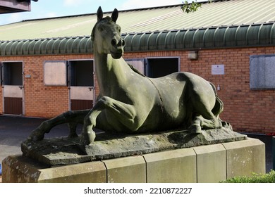 LOANHEAD, SCOTLAND - 06 October 2022 Sculpture Of A Horse At The Edinburgh University Dick Vet Equine Hospital With Stables In The Background