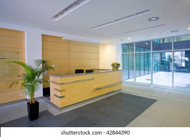 Lobby Entrance With Reception Desk  In A Business Center Building