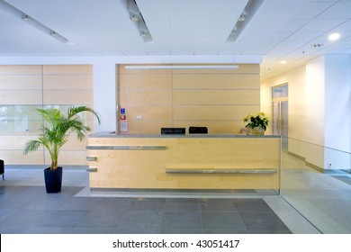 Lobby Entrance With Reception Desk  In A Business Center Building