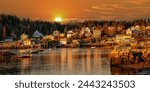 Lobster boats at anchor and bay front homes, Stonington, Maine