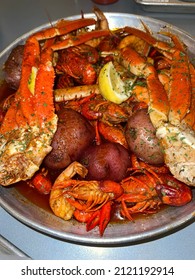 Lobster, Crab Legs, Shrimp, Potatoes, And Corn Seafood Boil 