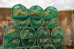 Lobster And Crab Traps Stack In A Port, Scotland, Elgol