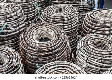 Lobster Or Crayfish Pots Stacked On Fishing Boat, Close Focus On Centre Pot, St Helens, Tasmania, Australia