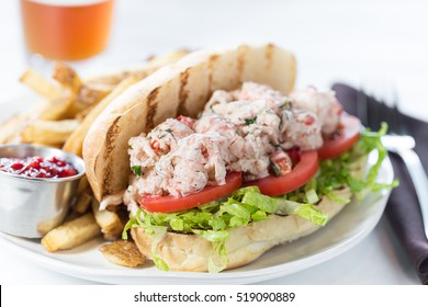 A Lobster Po' Boy sandwich and fries
